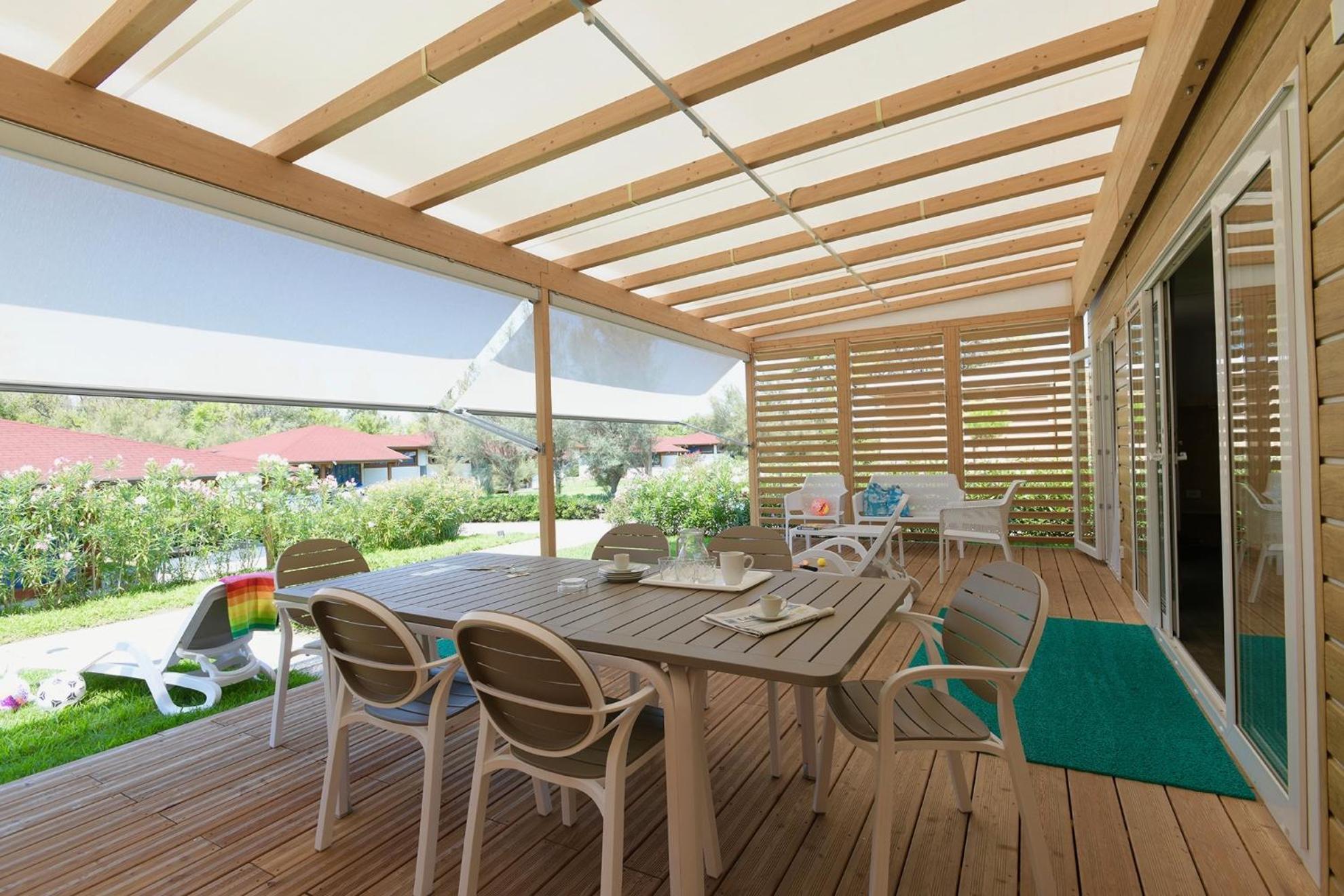 Isamar Holiday Village Ca Lino 客房 照片 A pergola with a retractable awning